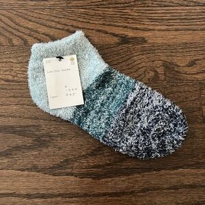 A New Day fuzzy socks